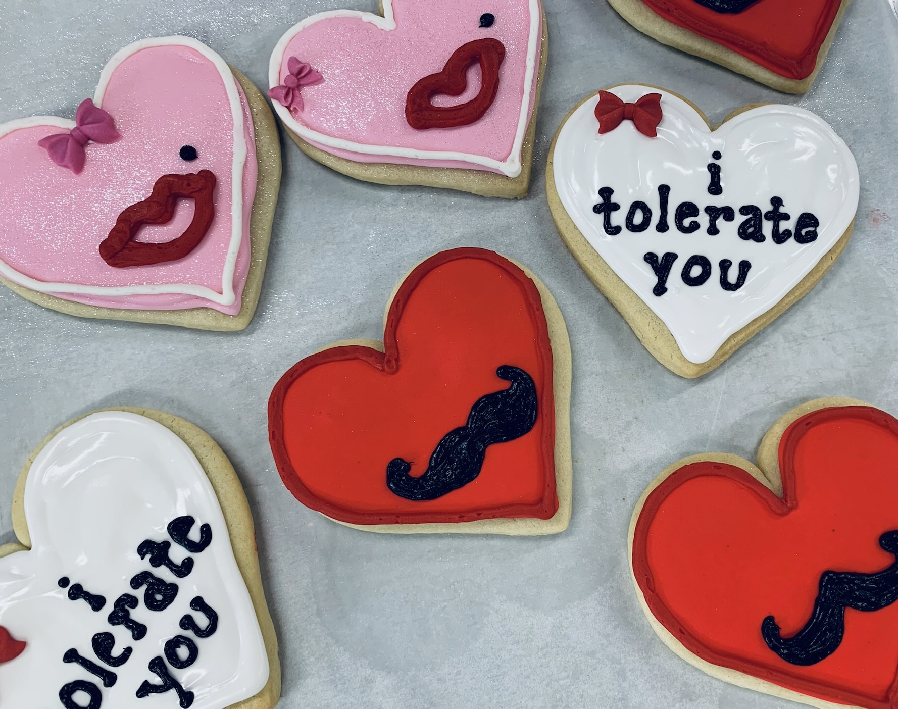 Valentine's Day cookies I tolerate you and mustache hearts